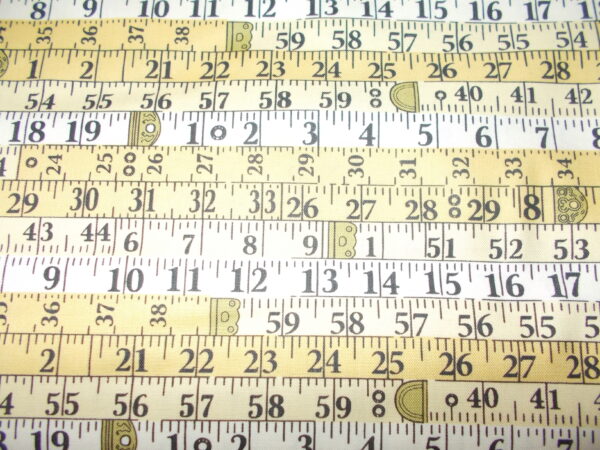 SEWING ROOM FABRIC - TAPE MEASURE YELLOW - X 1/2 METRE