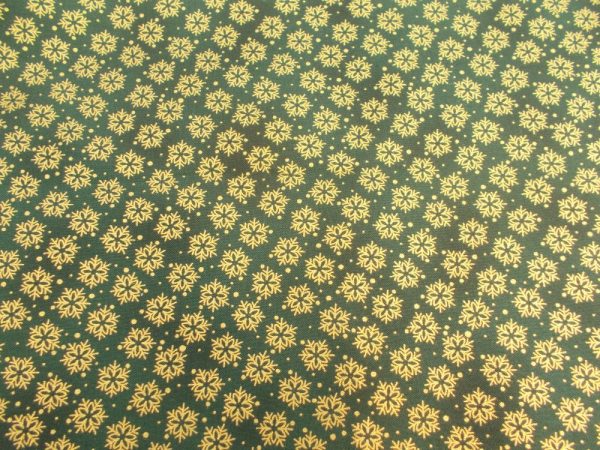 CHRISTMAS STOF - GREEN WITH GOLD FOILING - SNOWFLAKES X 0.5m